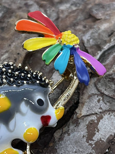 Hedgehog with daisy - enamel brooch badge